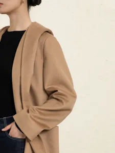 Elegant camel hooded wool coat for women, premium winter outerwear with comfortable fit.
