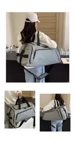 Large capacity grey sports duffel bag, waterproof fitness travel bag with shoulder strap.