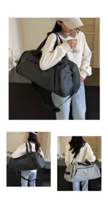 Detailed view of the large capacity sports duffel bag with shoulder strap in daily use.