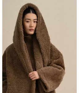 Oversized brown teddy hooded wool coat for women, cozy winter long plush outerwear.