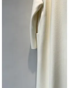 Luxury cashmere wool ripple robe coat detail, elegant long winter outerwear for women.
