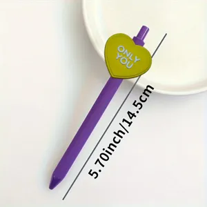 Detail shot of purple gel pen with cute yellow heart patch and writing specification.