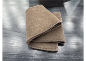Détail de tissu double face en laine de cachemire marron, texture de manteau d'hiver.