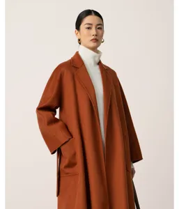 Elegant women's long wool blend bathrobe coat in a stunning rust orange shade for winter.