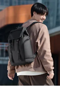 Large capacity business casual backpack for men, waterproof outdoor commute laptop bag.