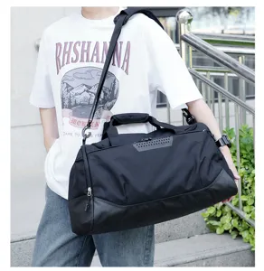 Large capacity black gym duffel bag for men and women sports travel fitness training waterproof.