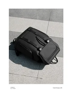Black water-resistant business backpack, large capacity outdoor commuter laptop bag with dual buckles.