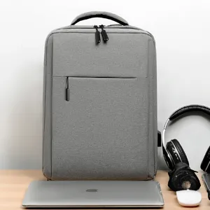 Grey business laptop backpack for men, large capacity multi-functional commuter daily bag.