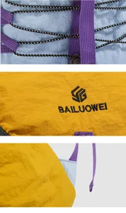 Detailed close-up of the outdoor hiking backpack showing contrast fabric and bungee cords.