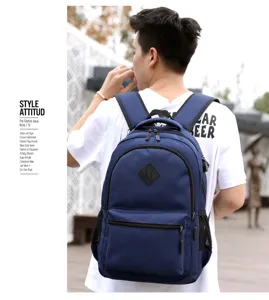 Classic navy blue canvas backpack with large capacity for daily commute and outdoor school use.