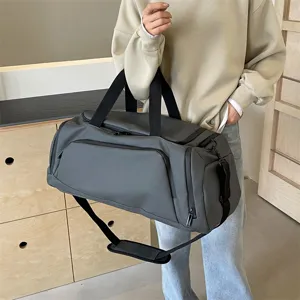 Large capacity sports gym duffel bag for fitness training travel shoulder and crossbody use
