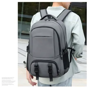 Large capacity grey travel backpack with multiple compartments and durable casual design.