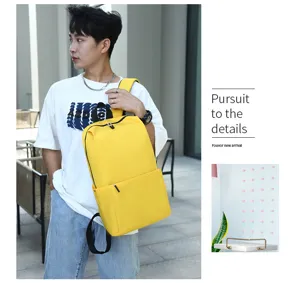 Minimalist casual yellow backpack for daily use, lightweight school bag with smooth zipper.