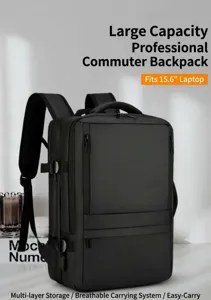 Detail shot of black business commuter backpack showing multi-layer storage and capacity.