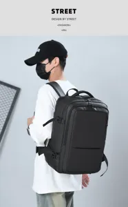 Detailed shot of a black multi-functional business travel backpack worn by a model.