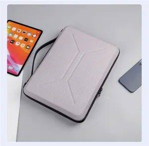 Detailweergave van de grijze EVA laptop tablettas met handvat en schokbestendig ontwerp.