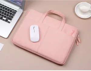 Detail view of the pink laptop sleeve on office desk with a mouse, durable fabric design.