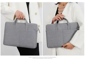 Grey oxford fabric laptop bag business briefcase with handles and front pocket storage.