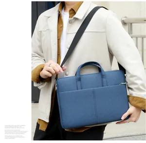 Blue oxford cloth laptop bag with double handles and shoulder strap for business daily use.