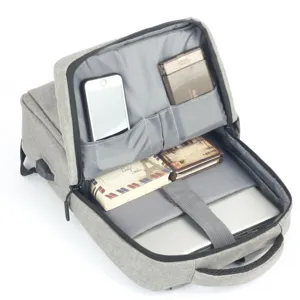 Large capacity grey laptop backpack interior detail view with multiple storage compartments.