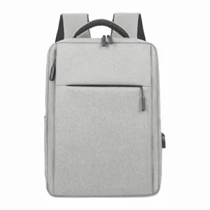 Large capacity grey business backpack for men and women, casual travel laptop school bag.