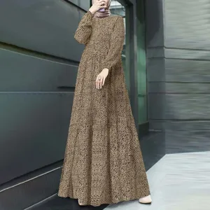 Detailed view of the elegant long-sleeve maxi dress featuring a vintage leopard print design.