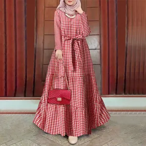 Detail view of the red and white plaid maxi dress featuring long sleeves and a matching belt.
