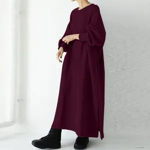 Detailed view of the casual burgundy long sleeve maxi sweatshirt dress with side slit.