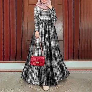 Black and white plaid maxi dress detail, featuring long sleeves, O-neck, and stylish waist belt.