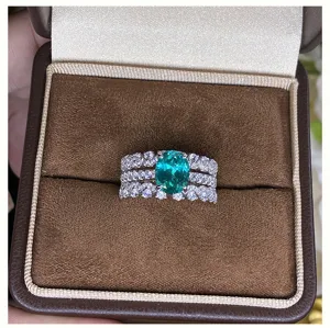 Stunning 925 silver oval Paraiba tourmaline ring with sparkling multi-row cubic zirconia.