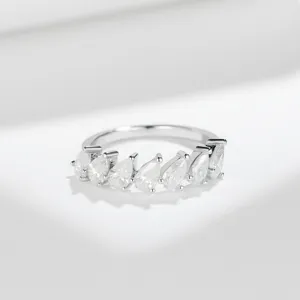 Pear-cut moissanite seven-stone row ring in S925 silver, elegant everyday fine jewelry.