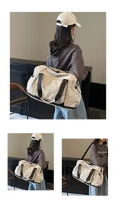 Large capacity travel duffel bag with black straps for women, practical fitness luggage.