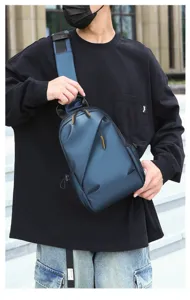 Detail view of the sleek dark blue men sling bag, showcasing crossbody style and durable build.