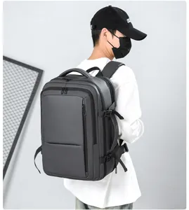 Detail view of the multi-functional business travel backpack worn by a model, showing capacity.