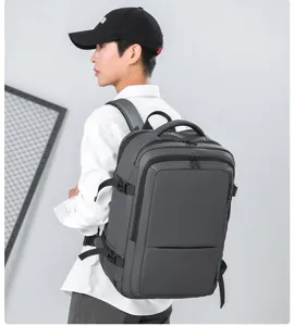 Detailed view of the large capacity dark grey business travel backpack with multi-compartments.