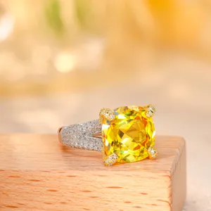Luxury S925 silver ring featuring a large cushion-cut yellow sapphire and sparkling pave band.