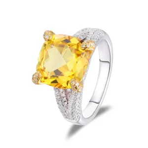 Stunning 925 silver ring featuring large cushion cut yellow gemstone and cubic zirconia.