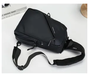 Detailed view of black waterproof nylon chest bag, adjustable strap and headphone port.