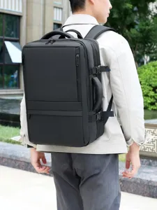 Large capacity business laptop backpack for men, waterproof travel commuter bag with pockets.