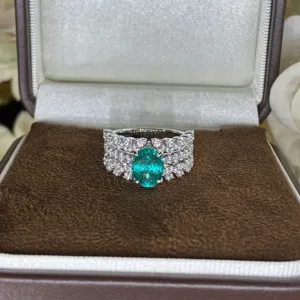 Stunning 2ct oval simulated Paraiba tourmaline ring with sparkling cubic zirconia in box