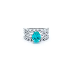 Stunning 925 silver multi-row ring with a vibrant oval teal stone and sparkling pavé stones.