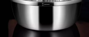 Stainless steel mixing bowl detail view, durable kitchen utility basin for food prep and washing.