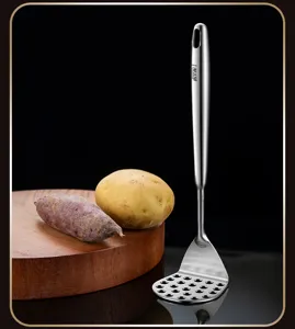 Stainless steel potato masher detail, heavy duty kitchen tool for mashing vegetables easily.