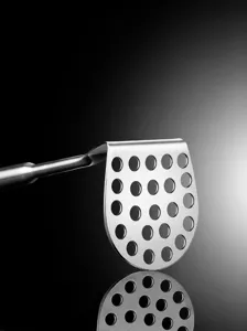 Stainless steel potato masher kitchen tool for baby food and household cooking use.