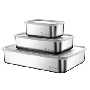 Contenedores de almacenamiento de alimentos de acero inoxidable apilados set cocina.