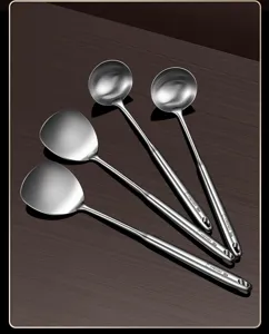 Stainless steel mini kitchen utensil set detail showing short handle spatulas and soup ladles.