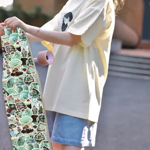 Detailed view of trendy mint chocolate skateboard stickers, perfect for DIY journaling notebooks.