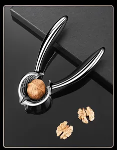 Durable metal nutcracker detail showing ergonomic handles and textured grip for easy nut shelling.