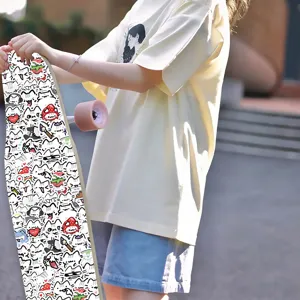 Detailed view of cute cat doodle longboard skateboard with playful cartoon designs and pink wheels.