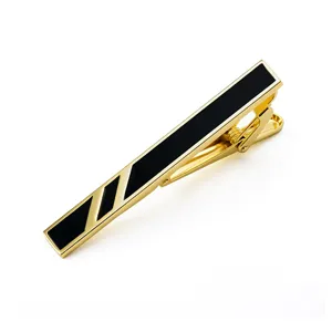 Gold tie clip for men with black enamel accent detail elegant business fashion accessory